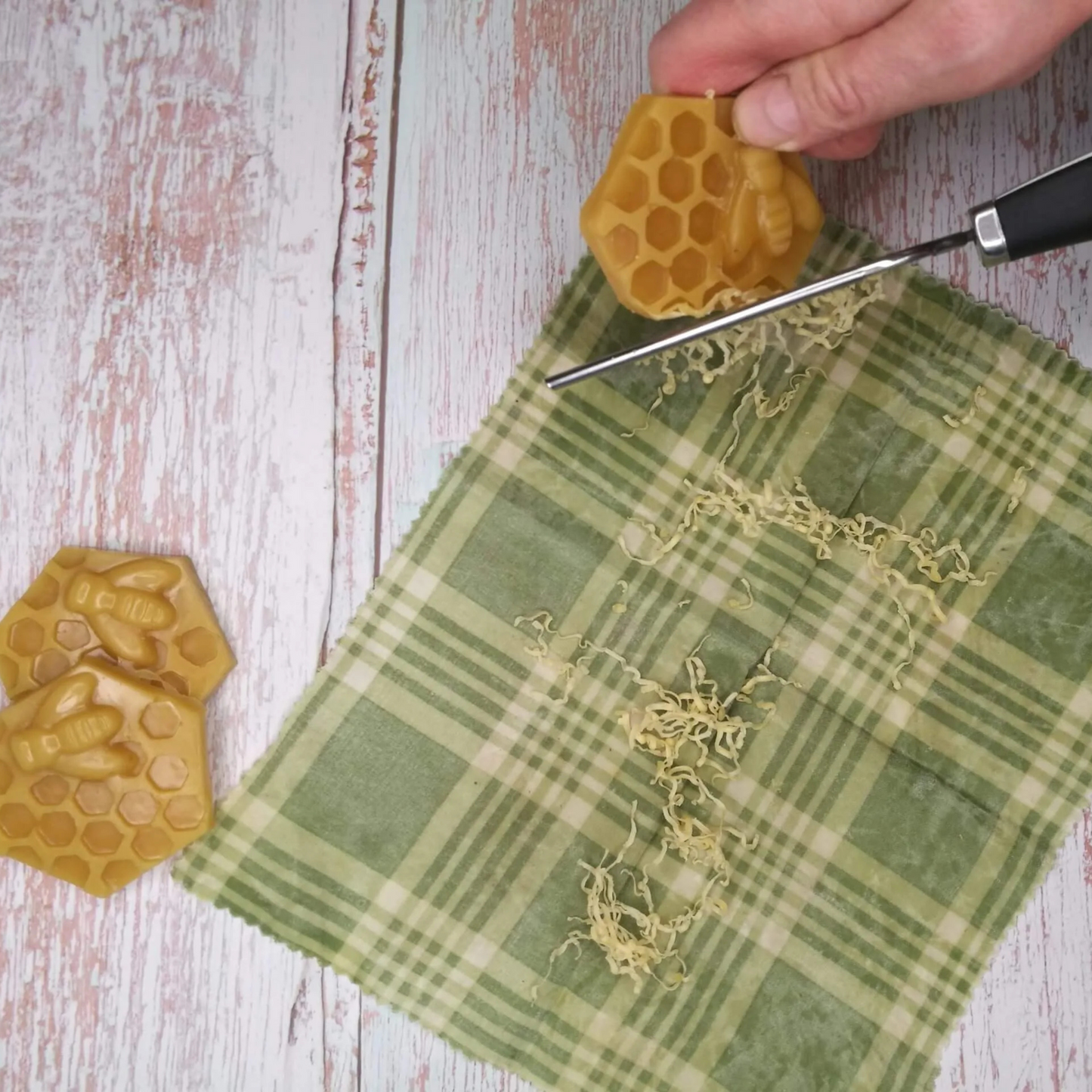 A piece of beeswax and pine resin, intended for renewing old Bee Wax canvas