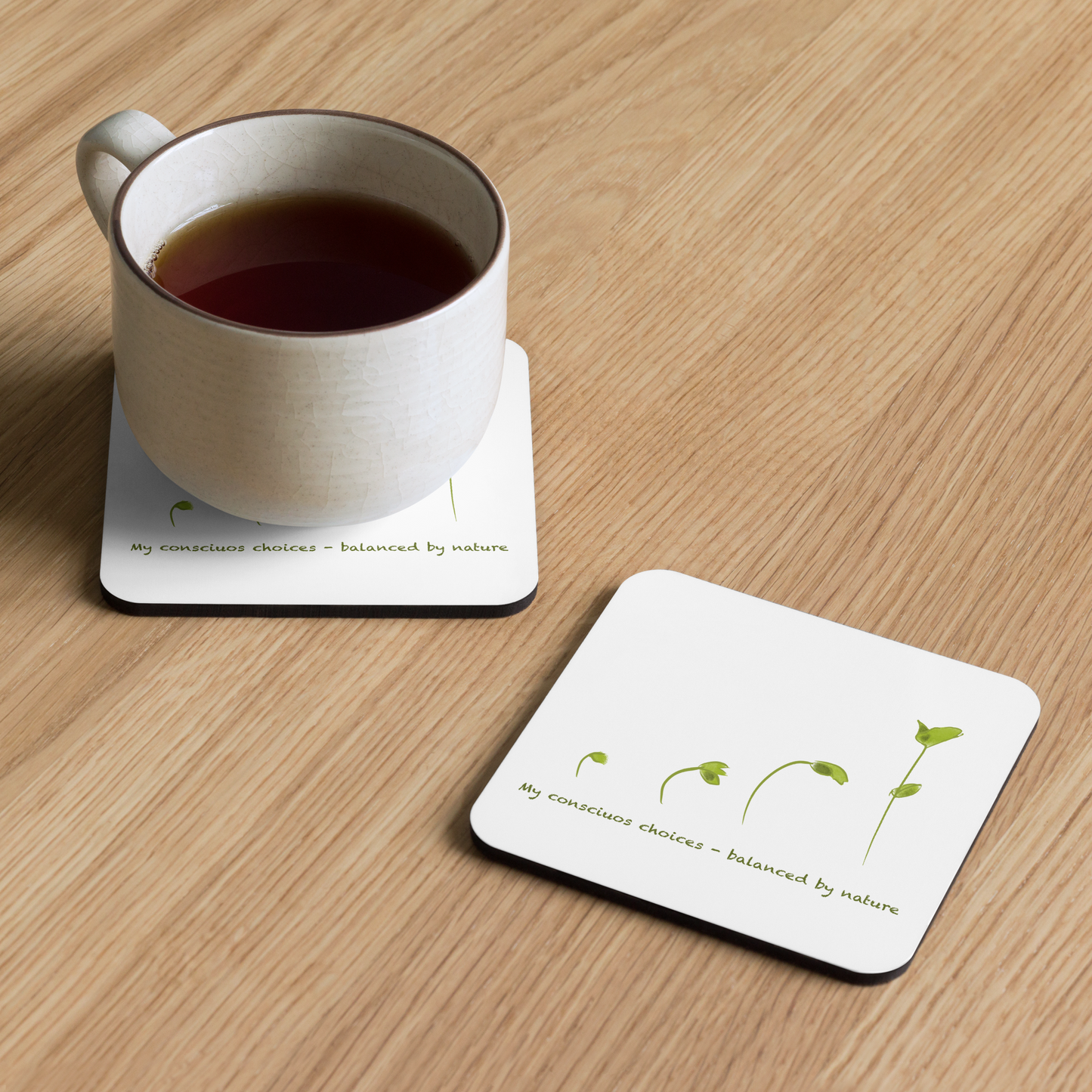 Cork-back coaster with the illustration of plant growth and words: My conscious choices - balanced by nature