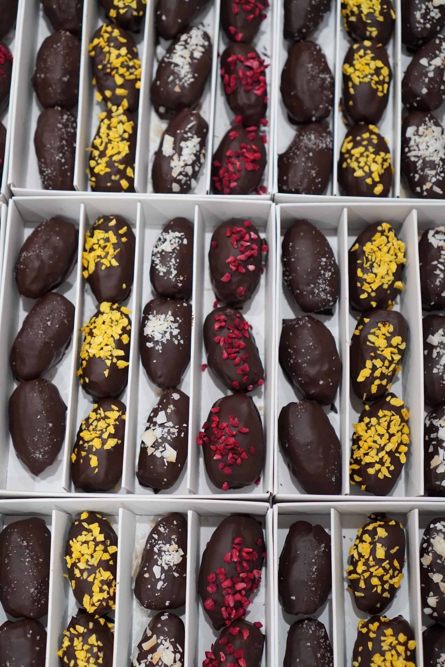 A pack of 12 medjool Dates filled with nuts covered with 100% cacao, 300g