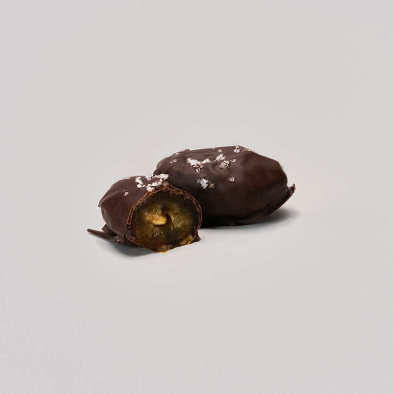 A pack of 12 medjool Dates filled with nuts covered with 100% cacao, 300g