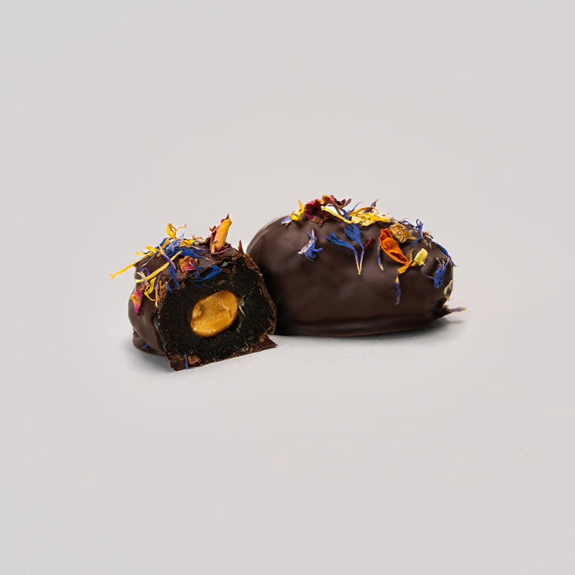 A pack of 12 medjool Dates filled with nuts covered with 100% cacao, 300g
