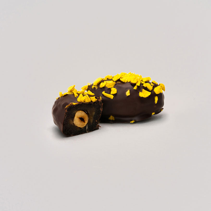 A pack of 12 medjool Dates filled with nuts covered with 100% cacao, 300g
